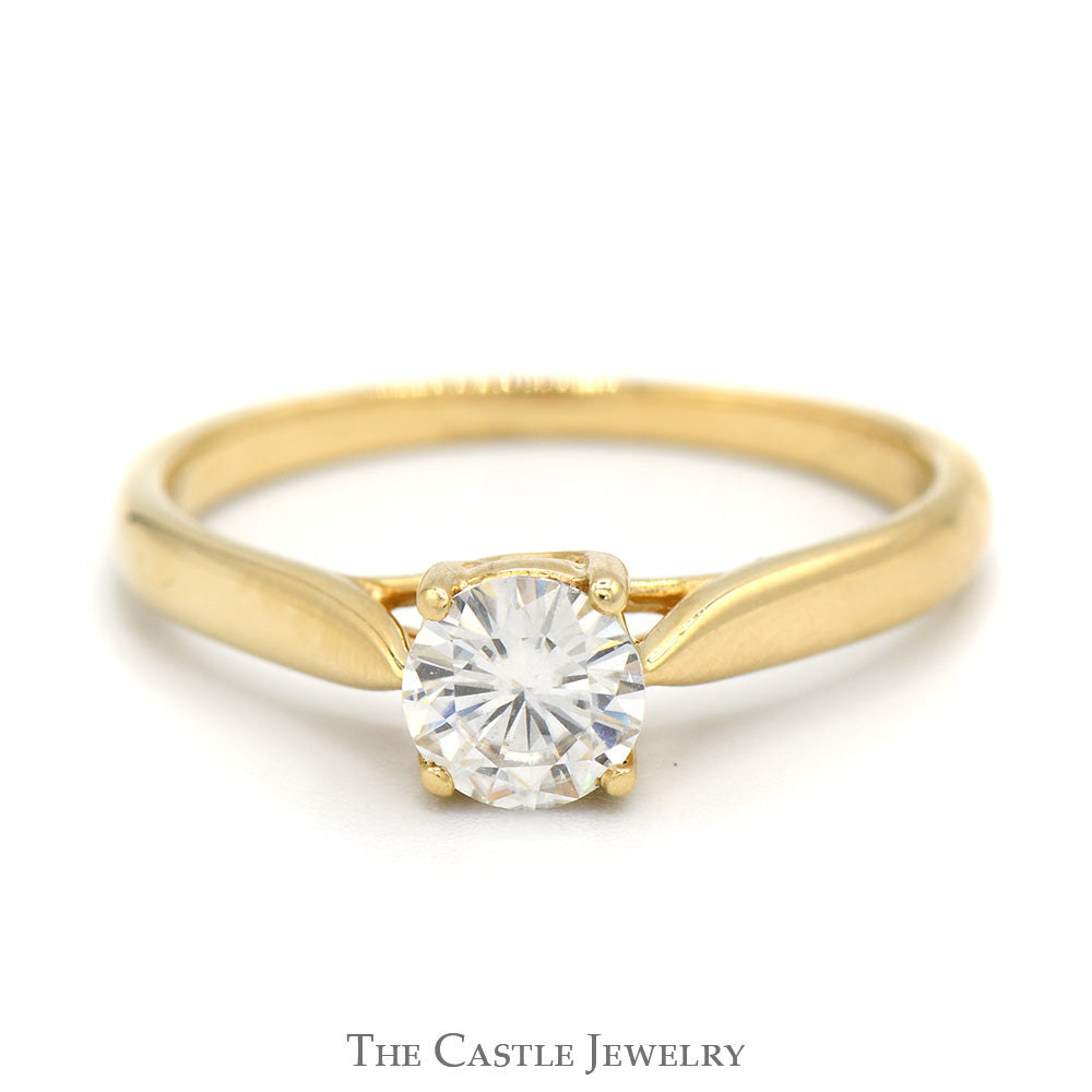 Round Moissanite Solitaire Engagement Ring in 10k Yellow Gold Cathedral Mounting