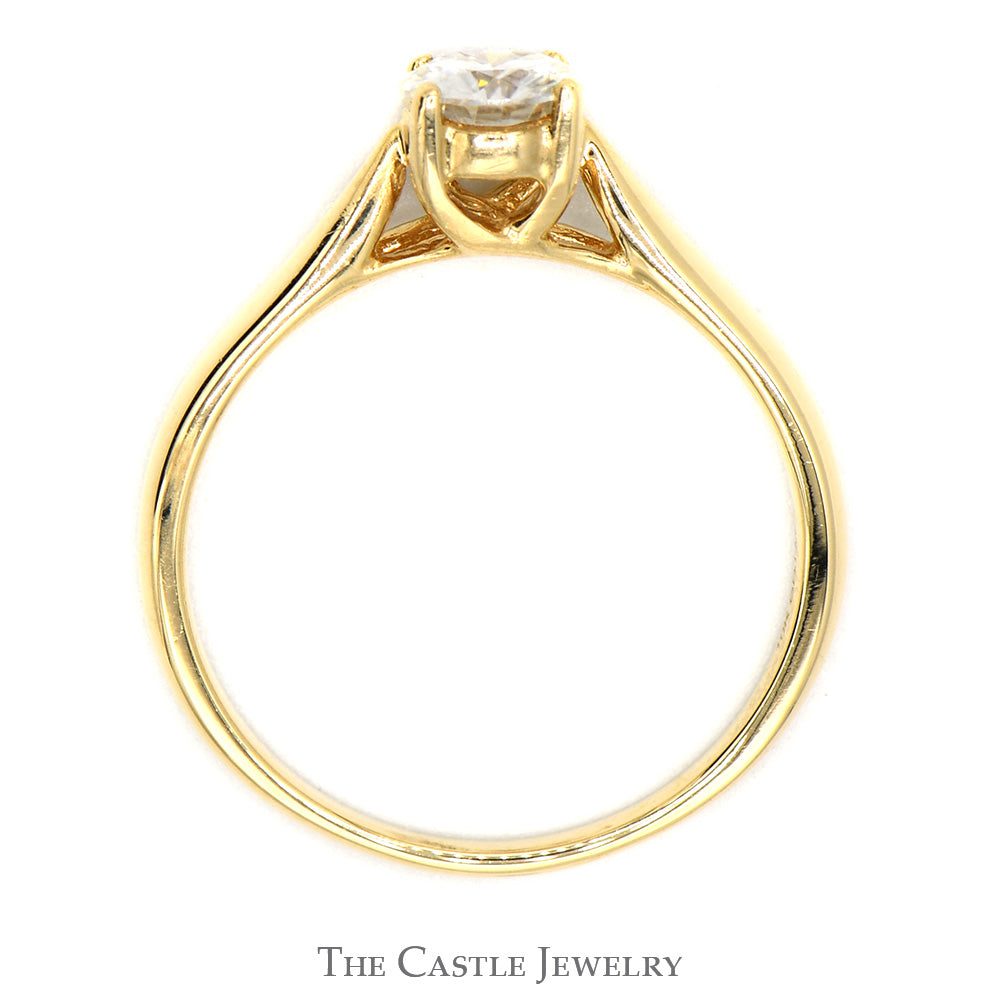 Round Moissanite Solitaire Engagement Ring in 10k Yellow Gold Cathedral Mounting