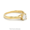 Round Moissanite Solitaire Engagement Ring in 10k Yellow Gold Cathedral Mounting - Thumbnail 3