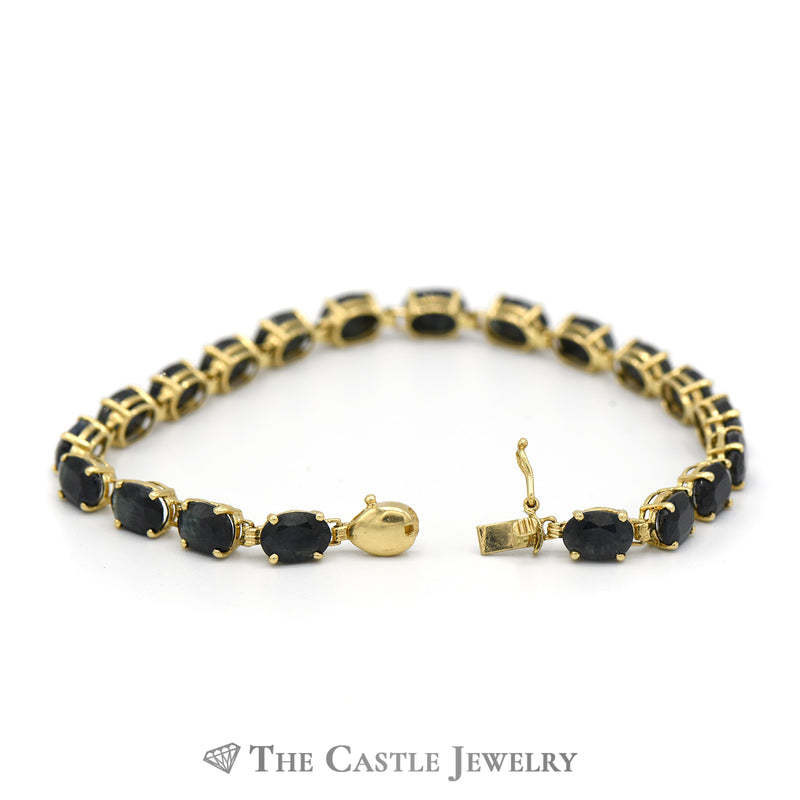 Oval Cut Sapphire Tennis Bracelet in 14k Yellow Gold 7.25 Inch