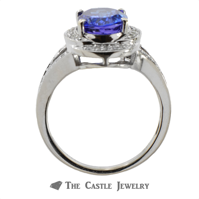 Oval Tanzanite Ring with Layered Diamond Bezel